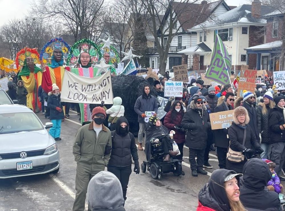 After an "ICE out of Minnesota" rally and march hosted by the Minnesota Immigrant Rights Action Committee Jan. 10, thousands of participants marched to the site of the ICE shooting that killed Renee Good in Minneapolis Jan. 7. (Tim Montgomery)