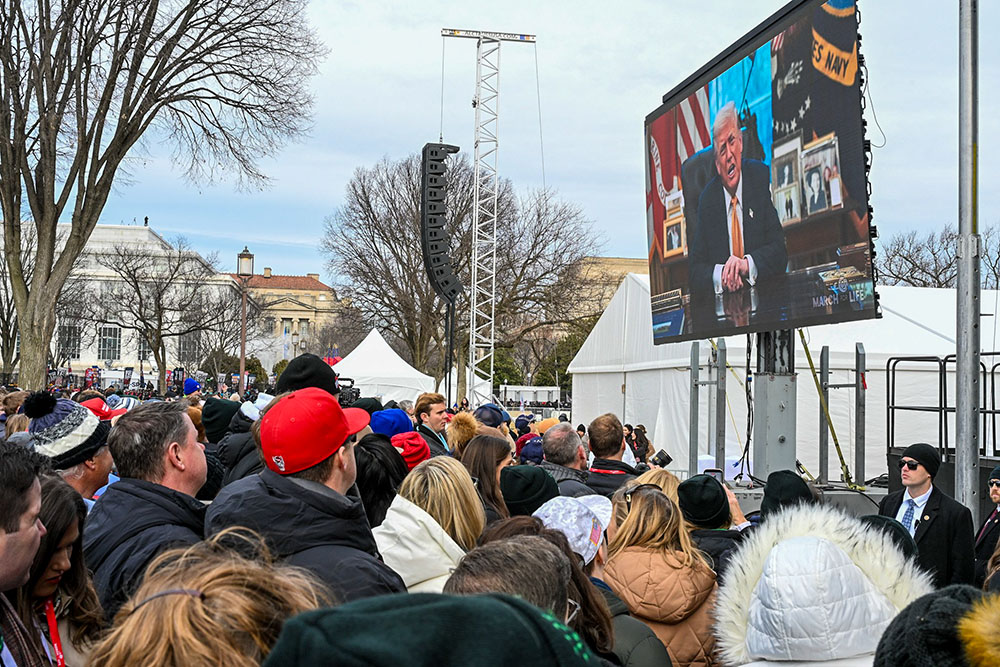 U.S. President Donald Trump is projected on a large video screen as he addresses attendees during the 53rd annual March for Life rally in Washington Jan. 23, 2026. (OSV News/Leslie E. Kossoff)