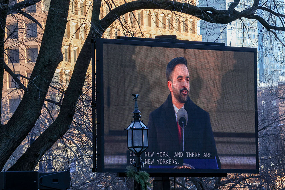 Mayor Zohran Mamdani appears on a large screen during his inauguration on the steps of City Hall Jan. 1, 2026, in New York. (AP/Heather Khalifa)