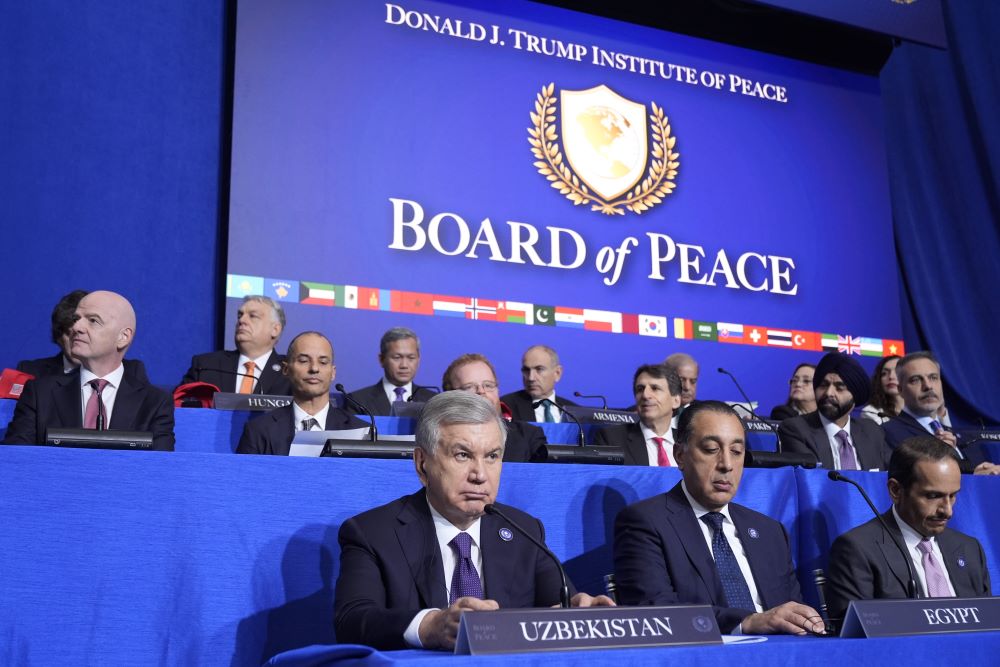 World leaders listen as President Donald Trump speaks during a Board of Peace meeting at the U.S. Institute of Peace Feb. 19 in Washington. The Vatican has declined to join the group. (AP/Mark Schiefelbein)