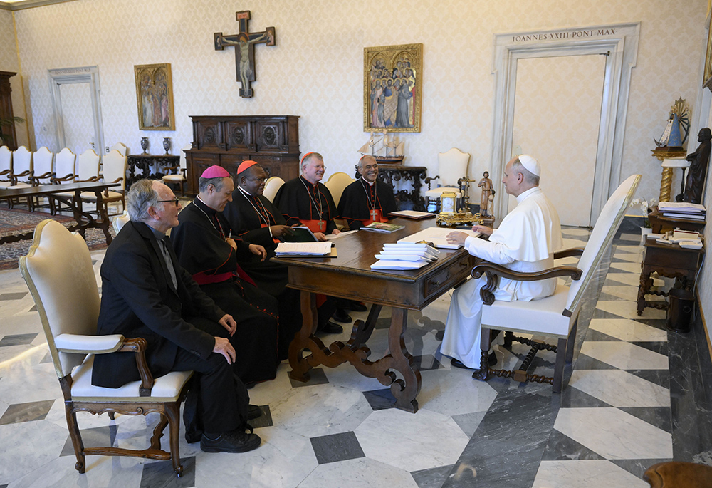 Pope Leo XIV meets with the heads of several bishops' conferences July 1, 2025, at the Vatican. From left are Indian Cardinal Filipe Neri Ferrão, president of the Federation of Asian bishops' conferences; Brazilian Cardinal Jaime Spengler of Porto Alegre, president of the Latin American bishops' council, known as CELAM; and Congolese Cardinal Fridolin Ambongo Besungu of Kinshasa, president of the Symposium of Episcopal Conferences of Africa and Madagascar, or SECAM; and other prelates. (OSV/Vatican Media)
