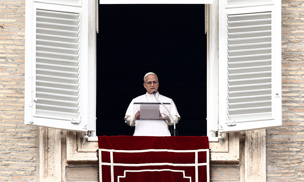 Pope Leo XIV leads the Angelus prayer from the window of the Apostolic Palace at the Vatican, March 1, 2026. (OSV News/Reuters/Guglielmo Mangiapane)