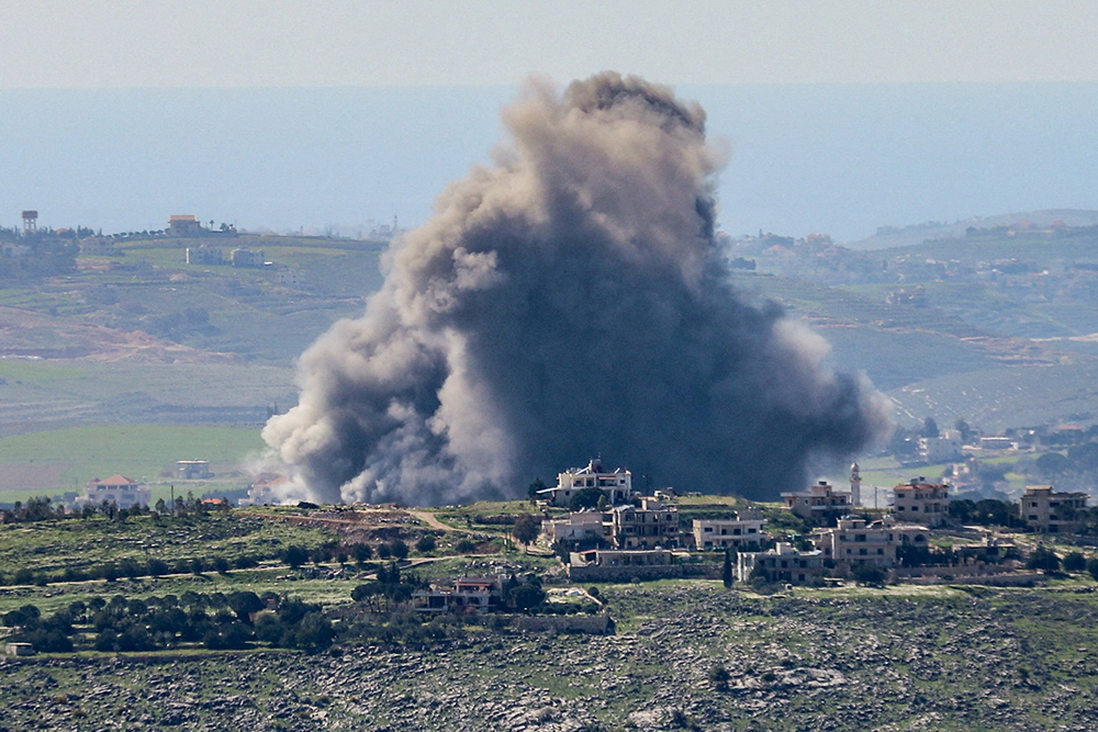 Smoke rises after Israeli strikes in Lebanon, following an escalation between Hezbollah and Israel amid the U.S.-Israeli conflict with Iran, as seen from Marjayoun, Lebanon, March 5, 2026. (OSV News/Reuters/Karamallah Daher)