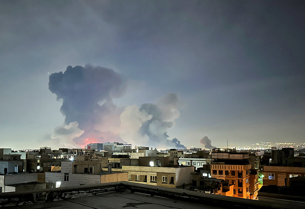 Smoke rises following an explosion in Tehran, Iran, March 7, 2026, amid the U.S.-Israeli war with Iran. (OSV News/West Asia News Agency via Reuters/Naser Safarzadeh)