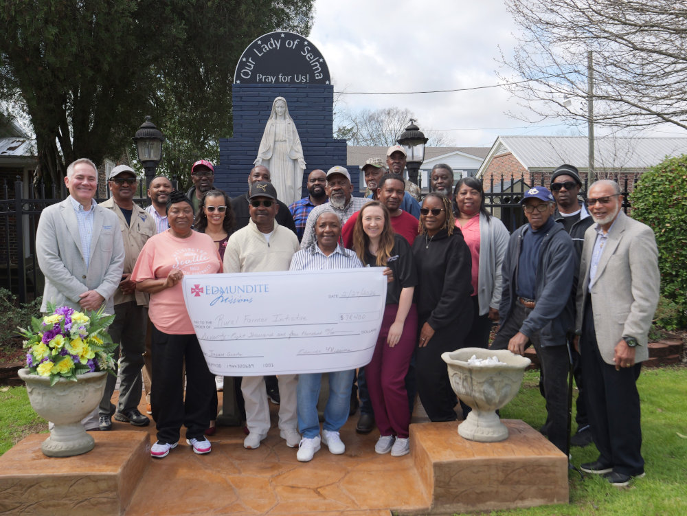 Chad Eachern, president and CEO of Edmundite Missions, far left, poses after presenting checks Feb. 27, 2026, to people participating in the Selma, Ala.-based Catholic social services agency's farming initiative that helps support small farmers in the South's impoverished Black Belt region. (OSV News photo/courtesy Edmundite Missions)