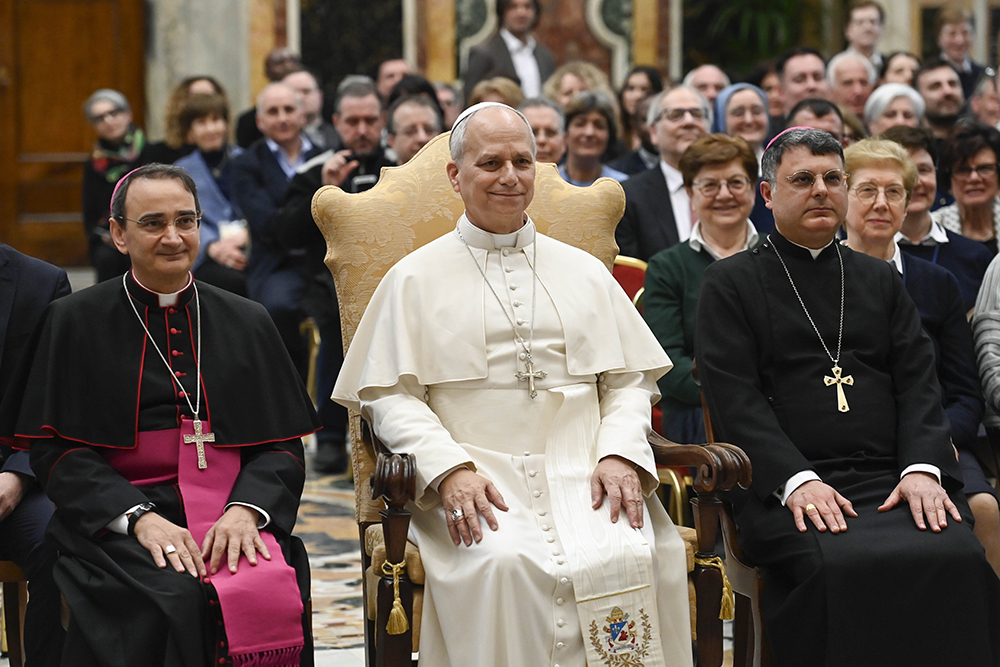 Pope Leo XVI listens to participants in the "Cattedra dell'Accoglienza," a cultural and educational event, in the Clementine Hall of the Apostolic Palace at the Vatican March 12, 2026. Addressing the group one week before the March 19 feast of St. Joseph, Leo reflected on Jesus' foster father's exemplary role as a responsible guardian for the Holy Family. (OSV News/Vatican Media/Matteo Pernaselci)