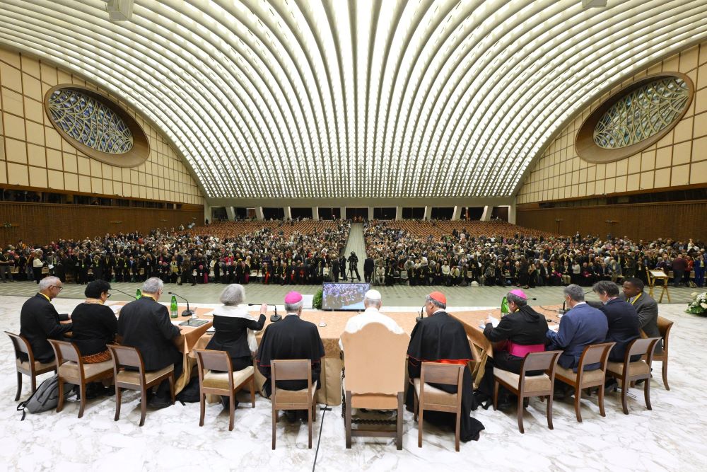 Pope Leo XIV, with regional representatives of synod teams, listens to and answers questions from participants in the Jubilee of Synodal Teams and Participatory Bodies in the Vatican audience hall Oct. 24, 2025. (CNS/Vatican Media)