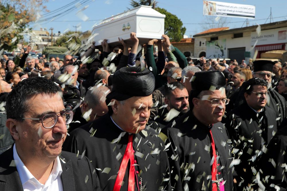 Mourners attend the funeral of Fr. Pierre al-Rahi, a priest who died of injuries he sustained from Israeli fire, according to medics and first responders, in Qlayaa, southern Lebanon, March 11, 2026, following an escalation between Hezbollah and Israel amid the U.S.-Israeli with Iran. (OSV News photo/Karamallah Daher, Reuters)