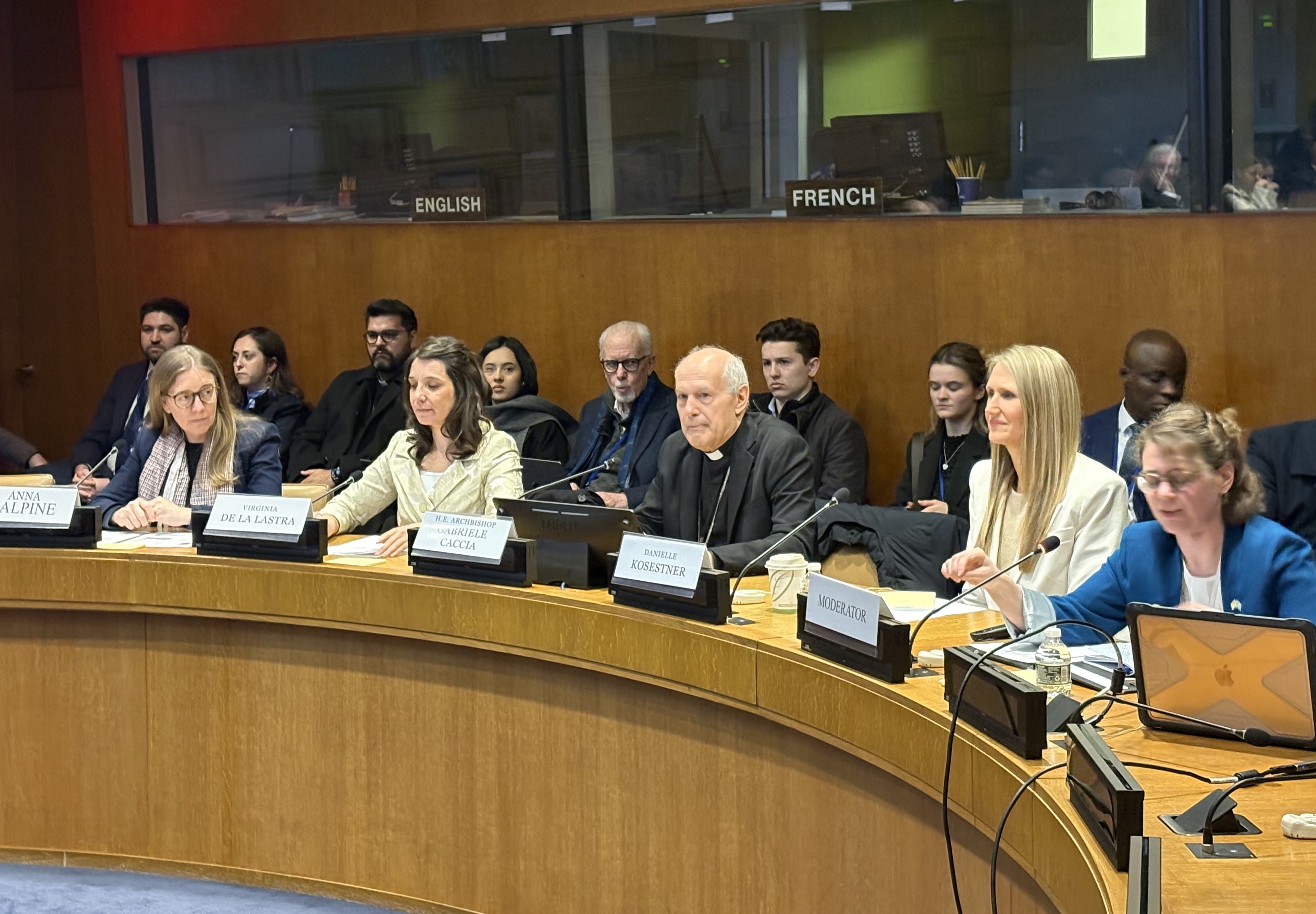 Archbishop Gabriele Caccia, the Vatican's permanent observer at the United Nations and newly appointed nuncio to the U.S. (center) speaks at a U.N. side event on women's health care March 18. He is surrounded by representatives from the Fertility Education and Medical Management Foundation and the Reproductive Health Research Institute. (NCR photo/Camillo Barone)