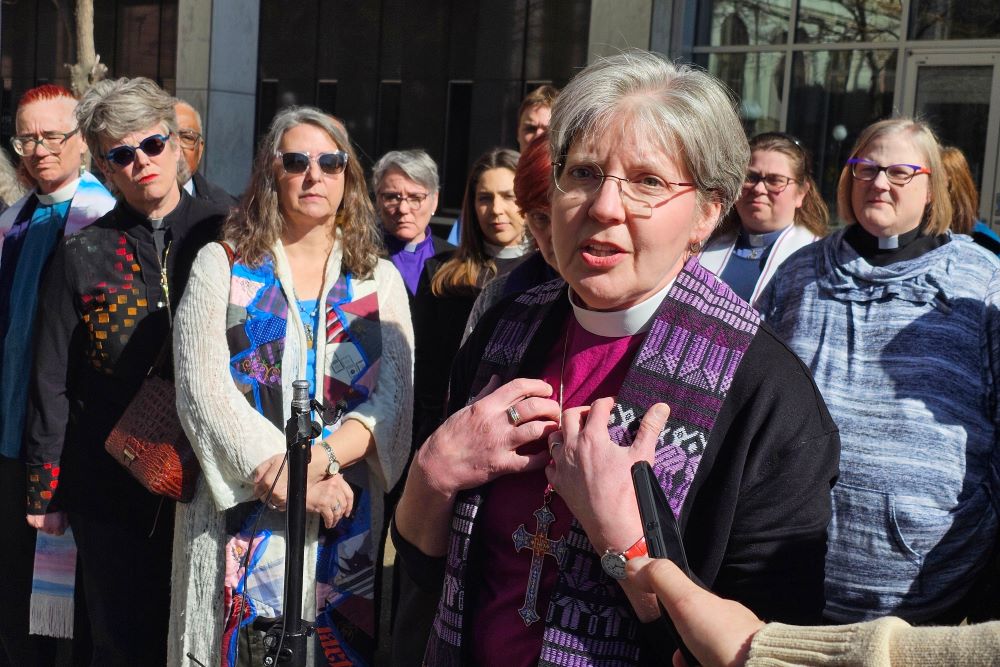 Bishop Jennifer Nagel, of the Minneapolis Synod of the Evangelical Lutheran Church in America, speaks to reporters outside the federal courthouse in St. Paul, Minn., on March 20, 2026, after a federal judge ruled that clergy will be allowed to minister to immigrants in a holding facility at the headquarters of the Trump administration's enforcement surge in Minnesota. (AP/Steve Karnowski)