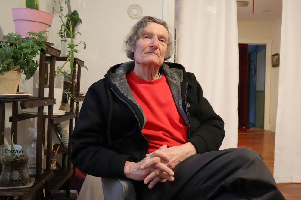 Claude Leboeuf, a clergy abuse survivor and advocate, poses at his home in Providence, R.I., March 5, after a report by the Rhode Island attorney general detailed decades of abuse within the Catholic Diocese of Providence. (AP Photo/Leah Willingham)