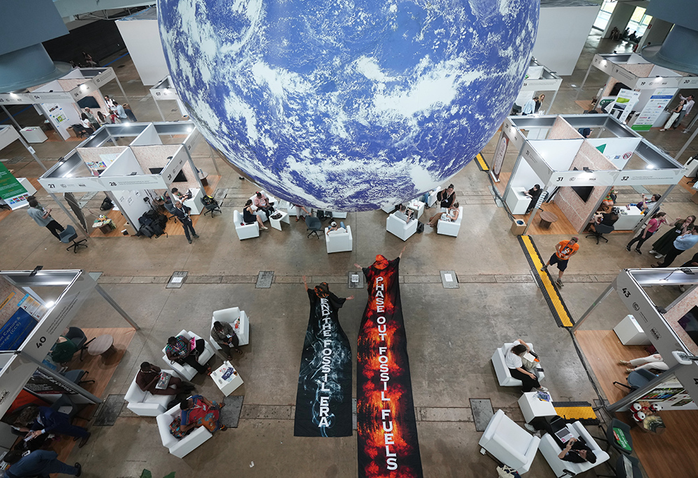Activists participate in a demonstration to end the use of fossil fuels at the COP30 U.N. Climate Summit, Nov. 20, 2025, in Belém, Brazil. (AP photo/Andre Penner)