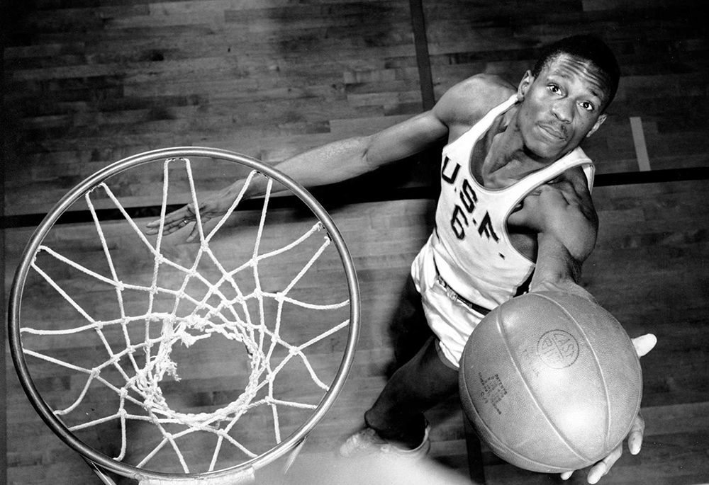 Bill Russell, playing for the University of San Francisco Dons, grabs a rebound. (Courtesy of the University of San Francisco)