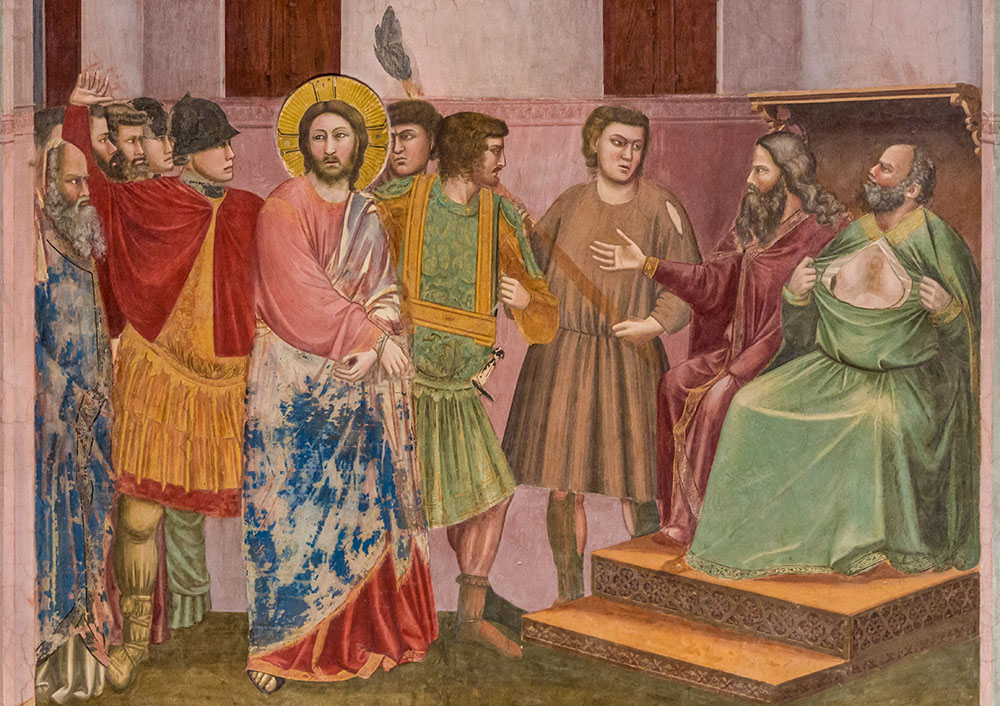The high priest Caiaphas is depicted tearing his robe in grief at Jesus' blasphemy in a detail from Giotto's 1305 fresco of the life of Christ, in the Scrovegni Chapel in Padua, Italy. (Wikimedia Commons/©Jörgens.mi, CC BY-SA 3.0)