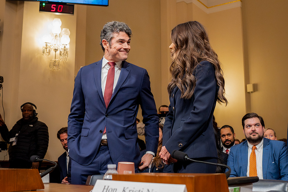 Joe Kent, then director of the National Counterterrorism Center, interacts with Department of Homeland Security Secretary Kristi Noem during a House Committee Homeland Security Hearing on Capitol Hill in Washington, D.C., Dec. 11, 2025. (Wikimedia Commons/DHSgov/Mikaela McGee)