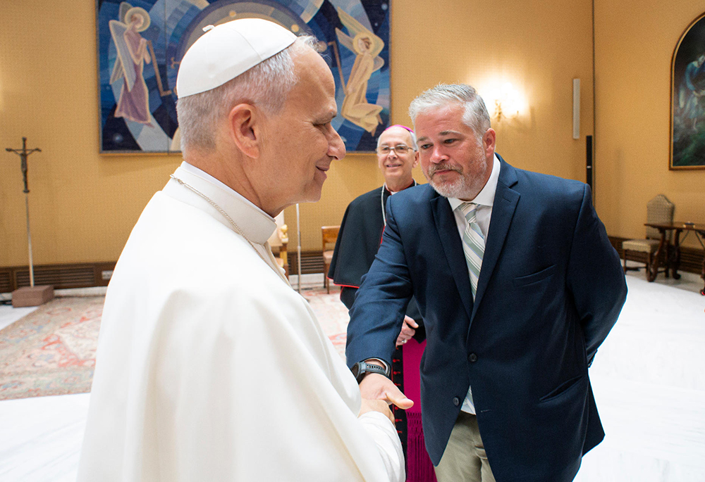 Dylan Corbett, executive director of the Hope Border Institute in El Paso, Texas, meeting Pope Leo XIV at the Vatican, in October 2025 (Courtesy of Vatican Media)