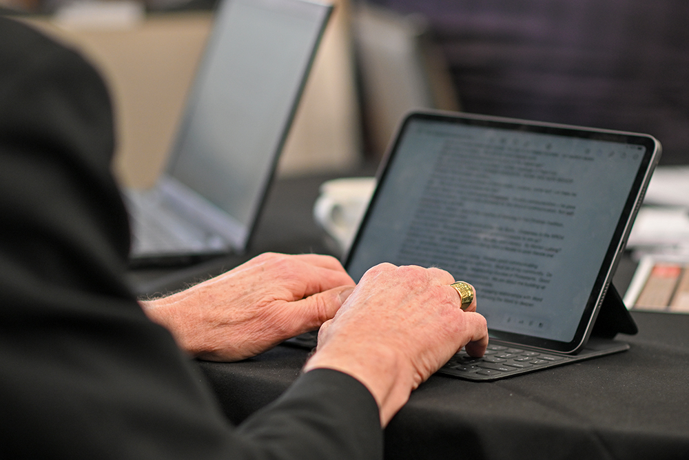 A participant types notes during the fifth annual Way Forward ecclesial gathering, held Feb. 25-27, 2026, at the University of St. Thomas in St. Paul, Minnesota. (Courtesy of University of St. Thomas/Nick Wosika)