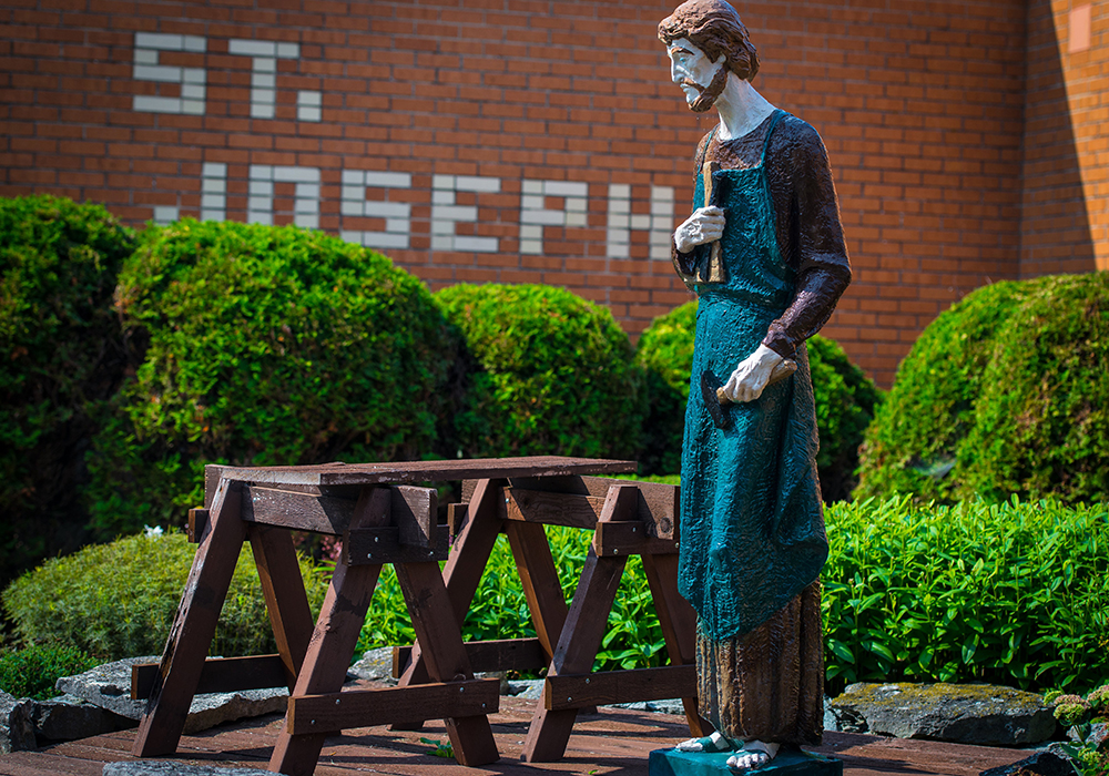 A statue of St. Joseph the Worker stands outside of St. Joseph Church in Oneida, Wisconsin. The feast day of St. Joseph the Worker, the foster father of Jesus and a carpenter, is May 1. (OSV News/Sam Lucero)
