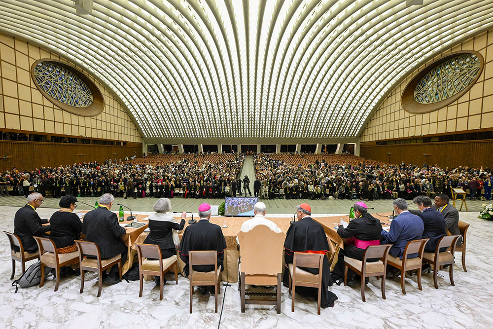 Pope Leo XIV, with regional representatives of synod teams, listens to and answers questions from participants in the Jubilee of Synodal Teams and Participatory Bodies in the Vatican audience hall Oct. 24, 2025. (CNS/Vatican Media)