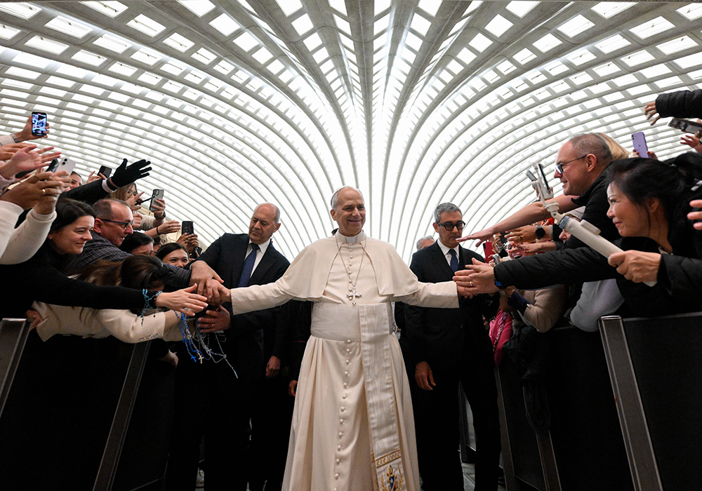 Pope Leo XIV greets people at the conclusion of his weekly general audience in the Paul VI Audience Hall at the Vatican Jan. 7, 2026. (CNS/Vatican Media)