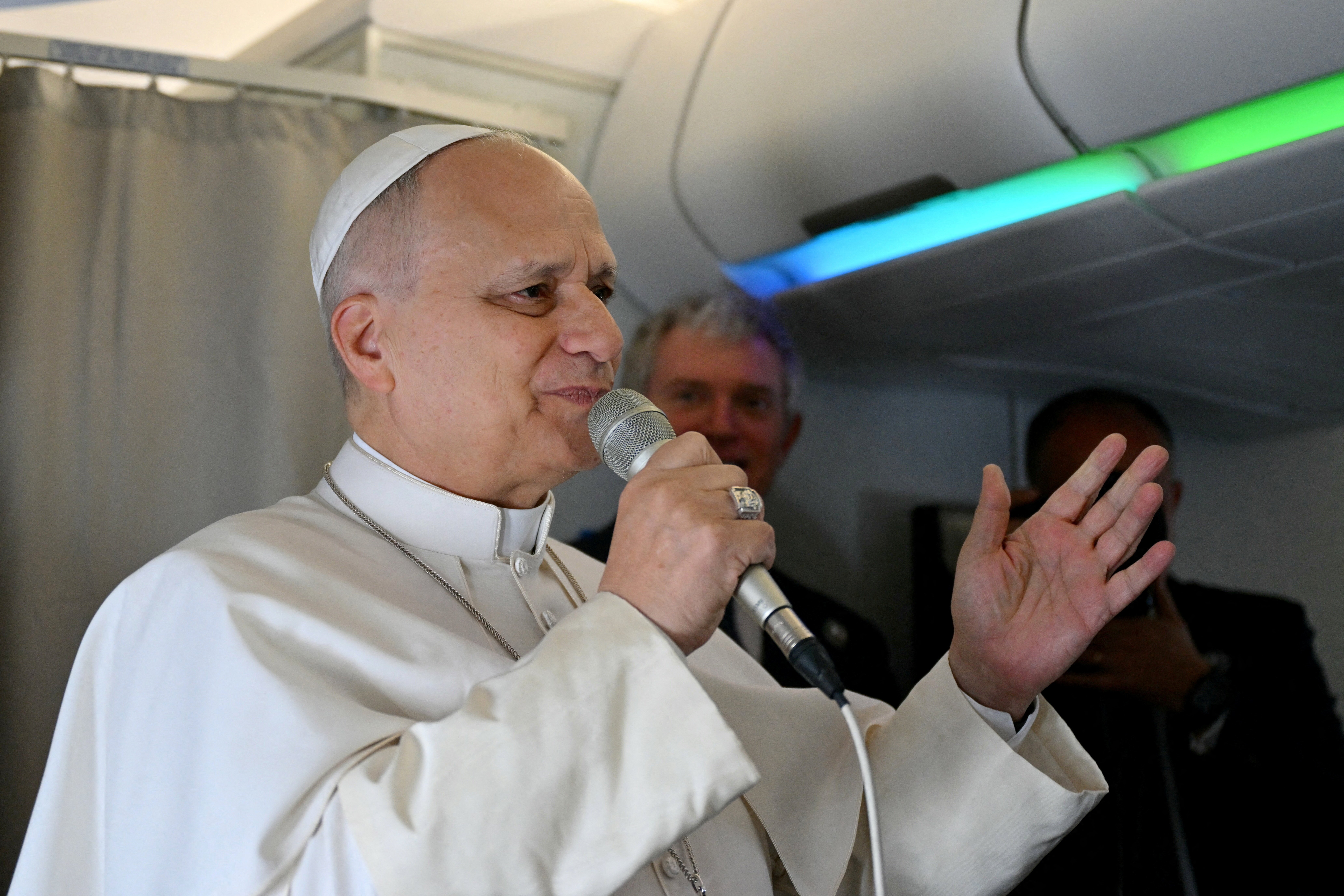 Pope Leo XIV addresses journalists during the flight heading to Algiers on April 13, 2026. Pope Leo XIV embarks on April 13 on an 11-day visit to Algeria, Cameroon, Angola and Equatorial Guinea for his first major international trip since becoming pontiff in May 2025. (OSV News/Alberto Pizzoli, Reuters)