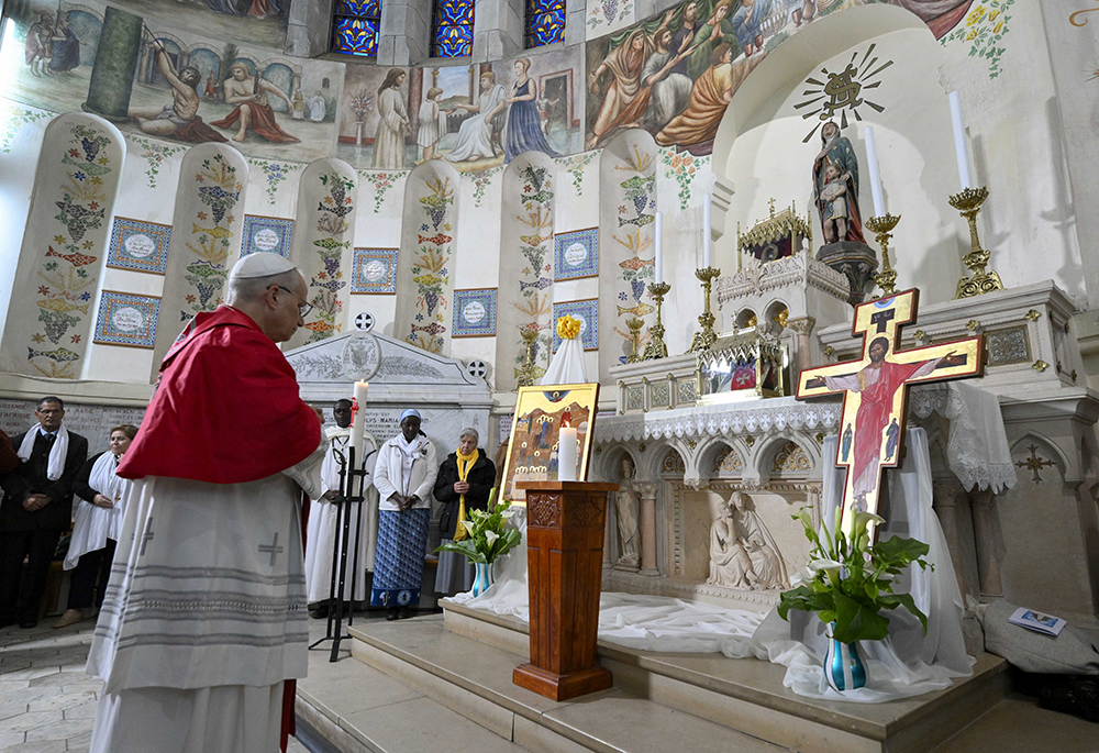 Pope Leo XIV prays during a meeting with the Algerian community at the Basilica of Our Lady of Africa in Algiers, Algeria, April 13, 2026. (OSV News/ Vatican Media/Simone Risolutie)