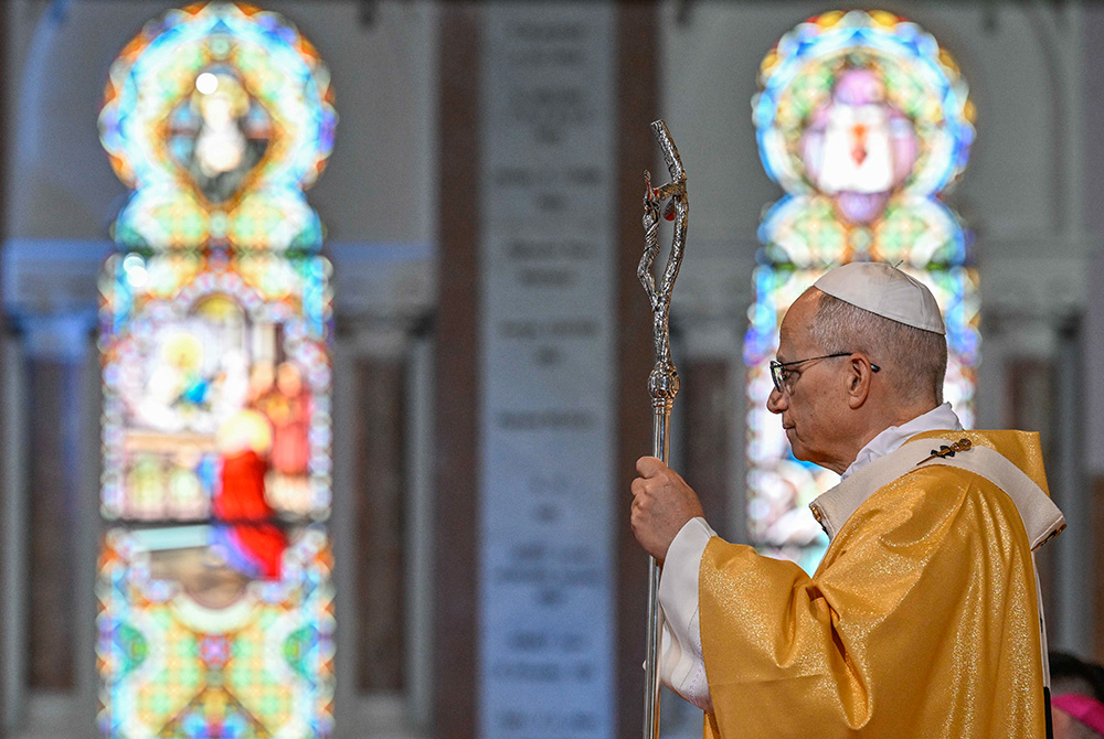 Pope Leo XIV stands with his crosier as he celebrates Mass at the Basilica of St. Augustine in Annaba, Algeria, April 14, 2026. (OSV News/Vatican Media/Simone Risoluti)
