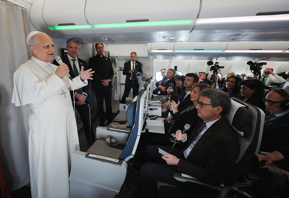 Pope Leo XIV speaks to journalists aboard a flight returning to Rome April 23, 2026, at the conclusion of his 11-day apostolic journey to Africa. (OSV News/Andrew Medichini, pool via Reuters)