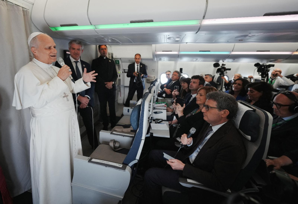 Pope Leo XIV speaks to journalists aboard a flight returning to Rome April 23, 2026, at the conclusion of his 11-day apostolic journey to Africa. (OSV News/Reuters/Andrew Medichini)