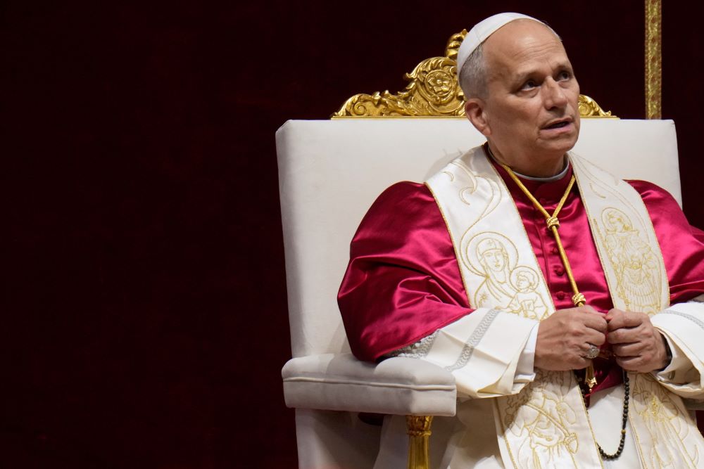 Pope Leo XIV leads a vigil for peace inside St. Peter's Basilica at the Vatican, April 11. After praying the rosary, Leo addressed world leaders in his call for peace. (AP/Gregorio Borgia)