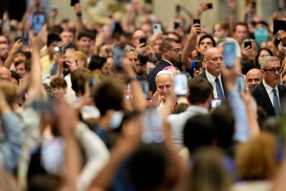 Pope Leo XIV arrives to lead a vigil for peace inside St. Peter's Basilica at the Vatican April 11. (AP/Gregorio Borgia)