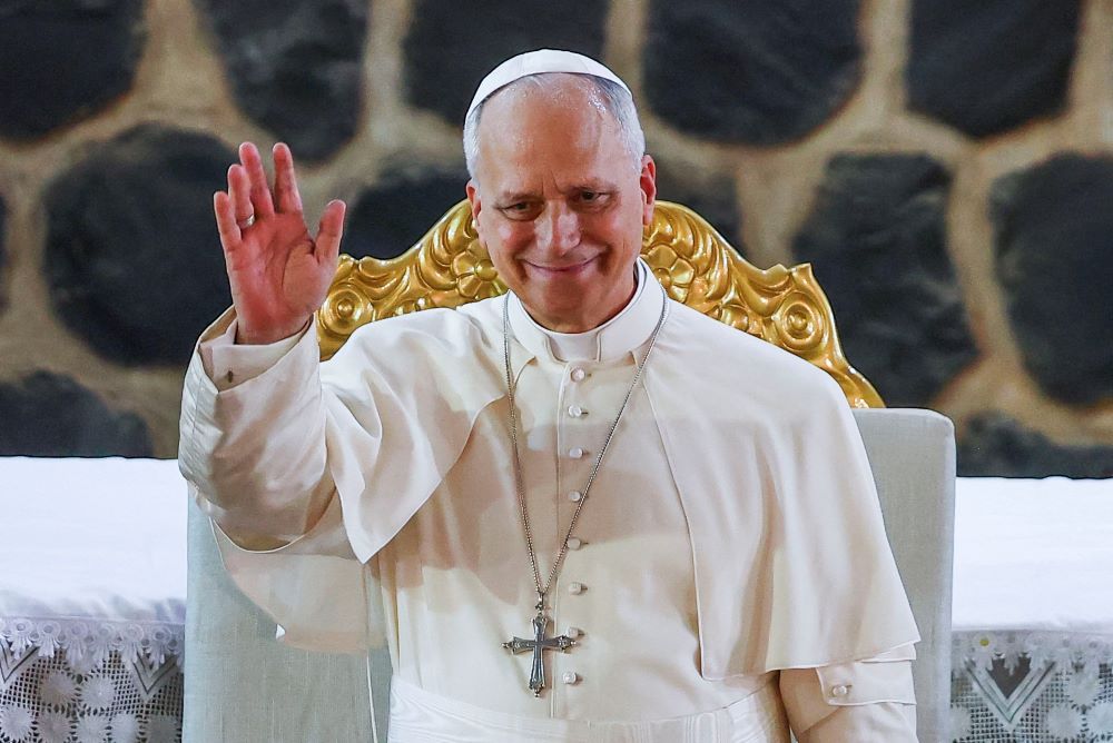 Pope Leo XIV waves as he attends a Meeting for Peace at St. Joseph's Cathedral in Bamenda, Cameroon, April 16, 2026. (OSV News/Reuters/Guglielmo Mangiapane)