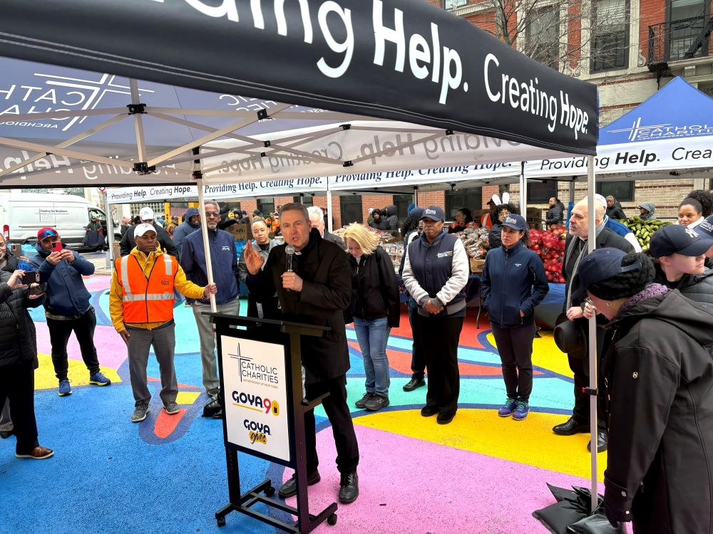 Archbishop Ronald Hicks of New York gives remarks at a Catholic Charities New York food distribution event in Washington Heights, Northern Manhattan, on Holy Thursday, April 2. (NCR photo/Camillo Barone)