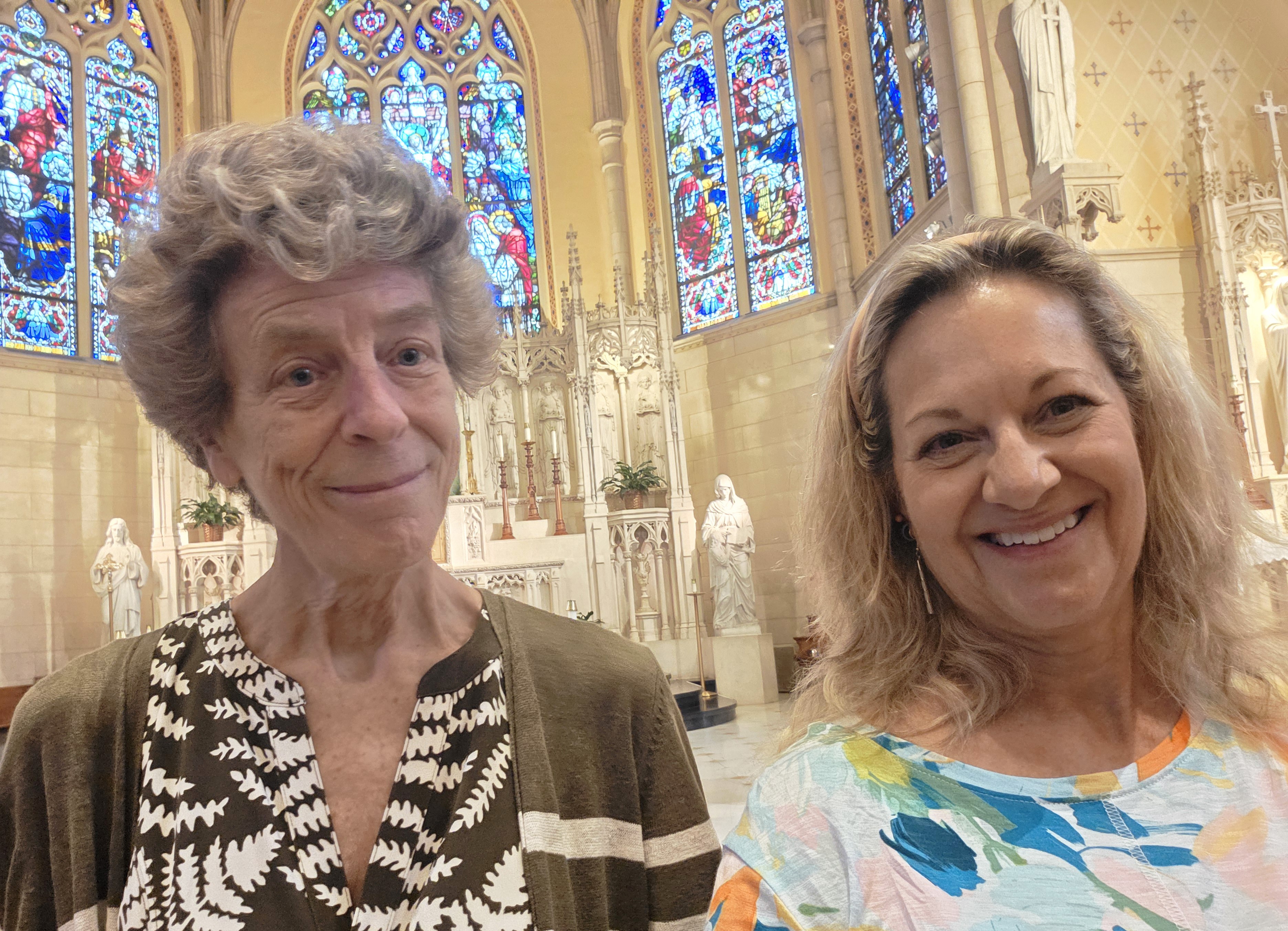 Rev. Vicki Garlock, right, takes a selfie with Dorothy Julian, director of stewardship, at St. Ita's Catholic Church in Chicago during her effort to obtain the Guinness World Record for most places of worship visited in one month, September 2025. Garlock visited 185 places of worship in Chicago in September. (Courtesy of Vicki Garlock)