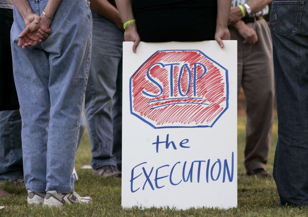 Protesters opposed to the death penalty are pictured in a file photo demonstrating outside a Georgia state prison for men in Jackson. (OSV News/Reuters/Tami Chappell)