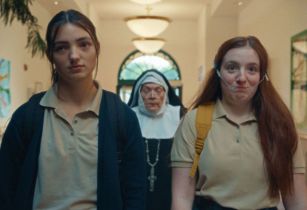 Adi Madden Cabrera, left, and McKenna Tuckett play Catholic school outcasts who start a punk band in "Edie Arnold is a Loser." (Katrina Wan PR)