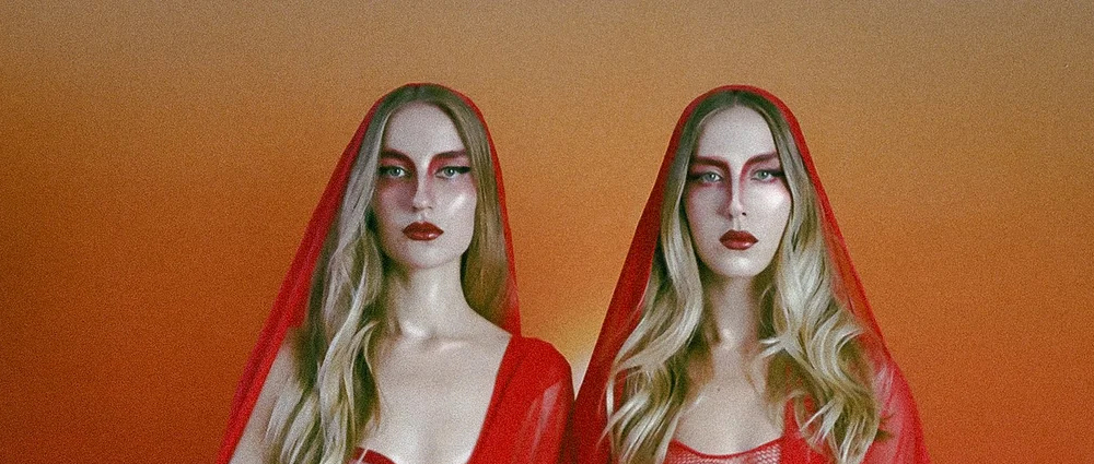 Twin sisters Elyse and Larena Winn originally formed the electropop MOTHERMARY as a way of working through the trauma they experienced in the Mormon church. (Courtesy of MOTHERMARY)