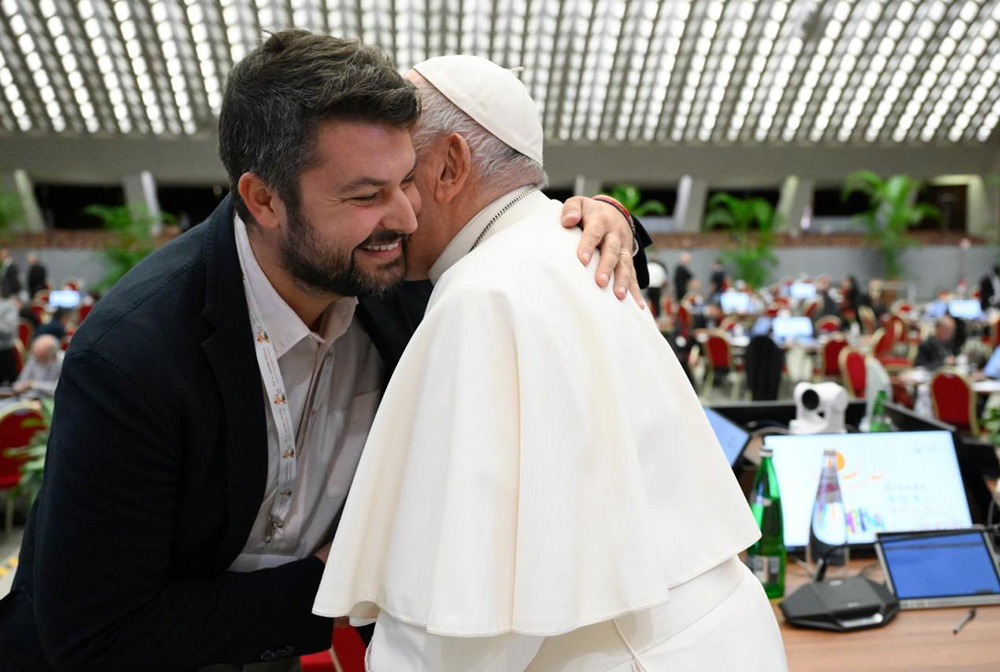 Salvatore Cernuzio and Pope Francis embrace in between meetings during the October 2023 synod on synodality at the Vatican. (Courtesy of Vatican Media)