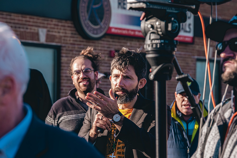 Michael Okinczyc-Cruz, executive director and co-founder of the Coalition for Spiritual and Public Leadership, speaks outside the Broadview ICE detention center, Feb. 18, 2026. (Courtesy of Coalition for Spiritual and Public Leadership/Derek Carter)