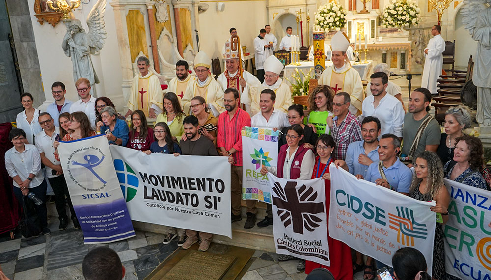 Officials with Catholic groups pose for a photo after Mass April 26, 2026, at the Cathedral Basilica of Santa Marta in Colombia. More than two dozen Catholic organizations were present in the coastal port city of Santa Marta to attend a meeting of 50-plus nations on implementing a phase out of fossil fuels, the primary driver of climate change. (Courtesy of Caritas Colombia)