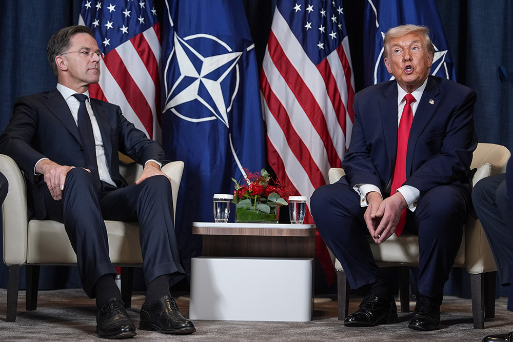 President Donald Trump, right, meets with NATO Secretary General Mark Rutte on the sidelines of the Annual Meeting of the World Economic Forum in Davos, Switzerland, Jan. 21, 2026. (AP/Evan Vucci)