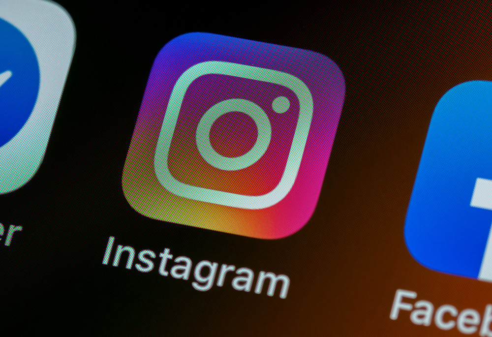 A photo illustration shows a close-up shot of the Instagram social media app on a smartphone screen. (Unsplash/Brett Jordan)