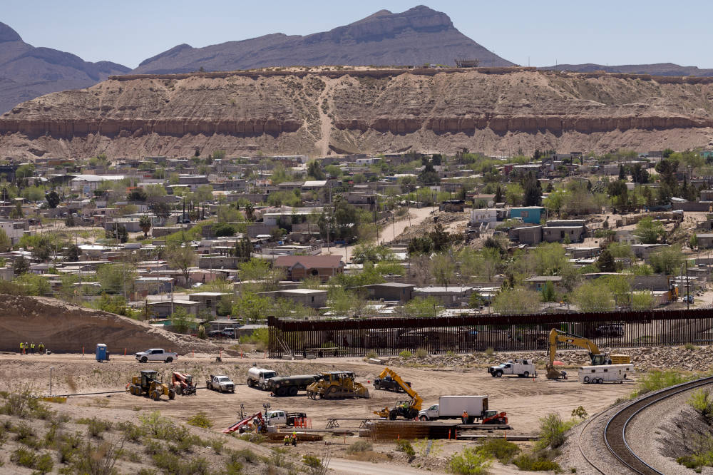 The border wall construction site is seen across from the Mexican neighborhood of Anapra on March 24, 2026. (Gaby Velasquez/Puente News Collaborative)