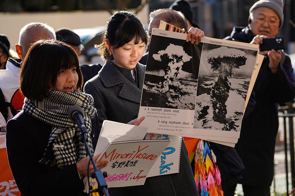 Representatives of the Hiroshima Nagasaki Peace Messengers speak across the street from United Nations headquarters in New York City during a rally to abolish nuclear weapons Nov. 28, 2023. Catholic Worker and Pax Christi members were among the participants. (OSV News/Gregory A. Shemitz)