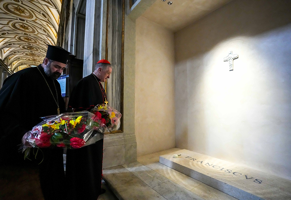 Greek Orthodox Metropolitan Nathanael of Chicago and Cardinal Blase J. Cupich of Chicago bring flowers to the tomb of Pope Francis in the Basilica of St. Mary Major in Rome, March 2, 2026. They were taking part in an ecumenical pilgrimage together to celebrate the 1,700th anniversary of the Council of Nicaea. (CNS/Lola Gomez)