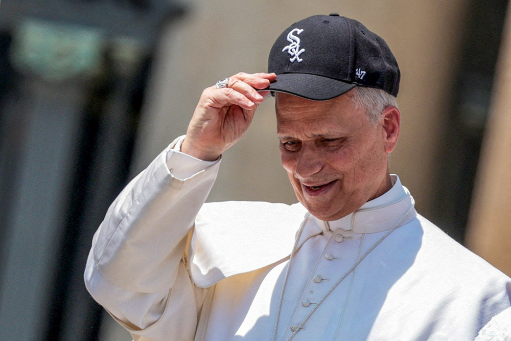 Pope Leo XIV wears a Chicago White Sox baseball cap during his weekly general audience in St. Peter's Square at the Vatican June 11, 2025. (OSV News/Remo Casilli, via Reuters)