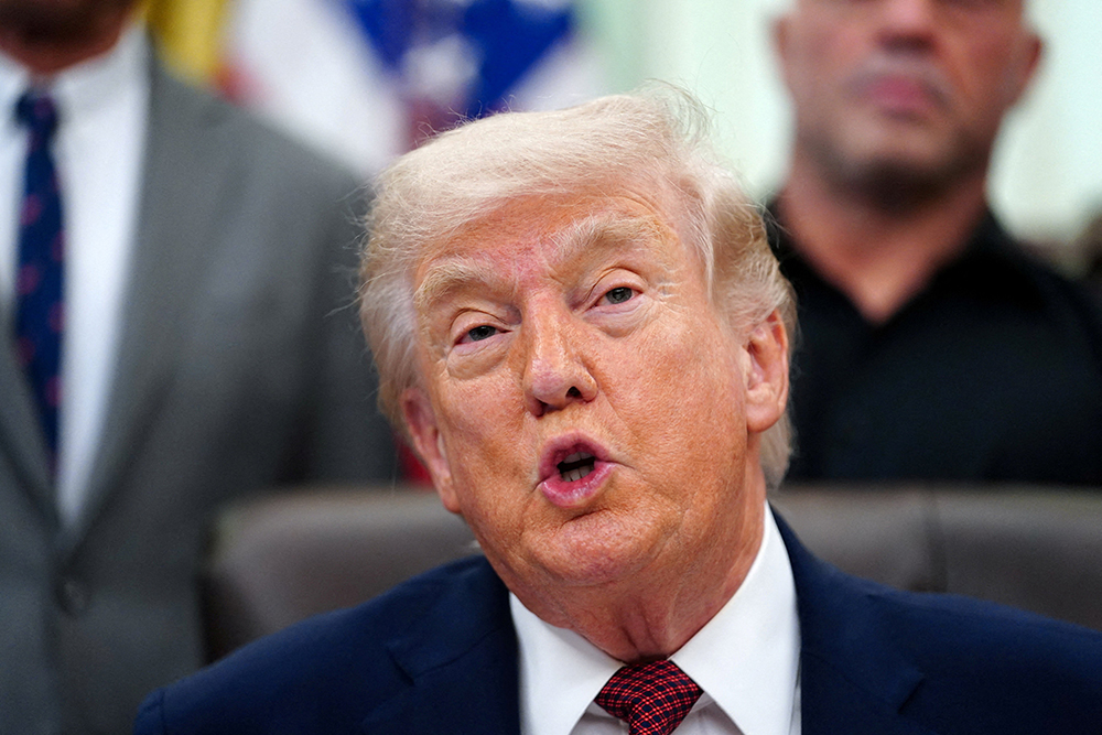 U.S. President Donald Trump speaks to the media in the Oval Office of the White House in Washington April 18, 2026. (OSV News/Reuters/Nathan Howard)
