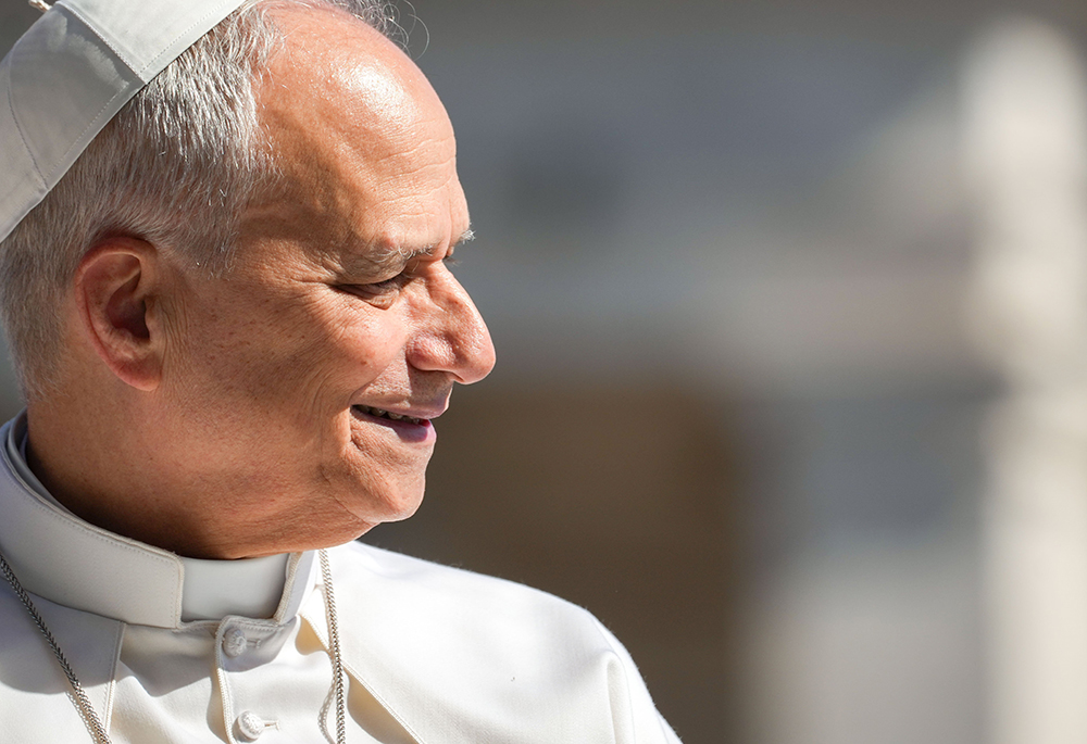 Pope Leo XIV smiles as he greets visitors and pilgrims from the popemobile while riding around St. Peter’s Square at the Vatican before his weekly general audience May 20, 2026. Leo wrote a message to graduates of his alma mater Villanova University that Augustinian Fr. Peter Donohue read at the university's commencement on May 19, 2026. (CNS/Lola Gomez)