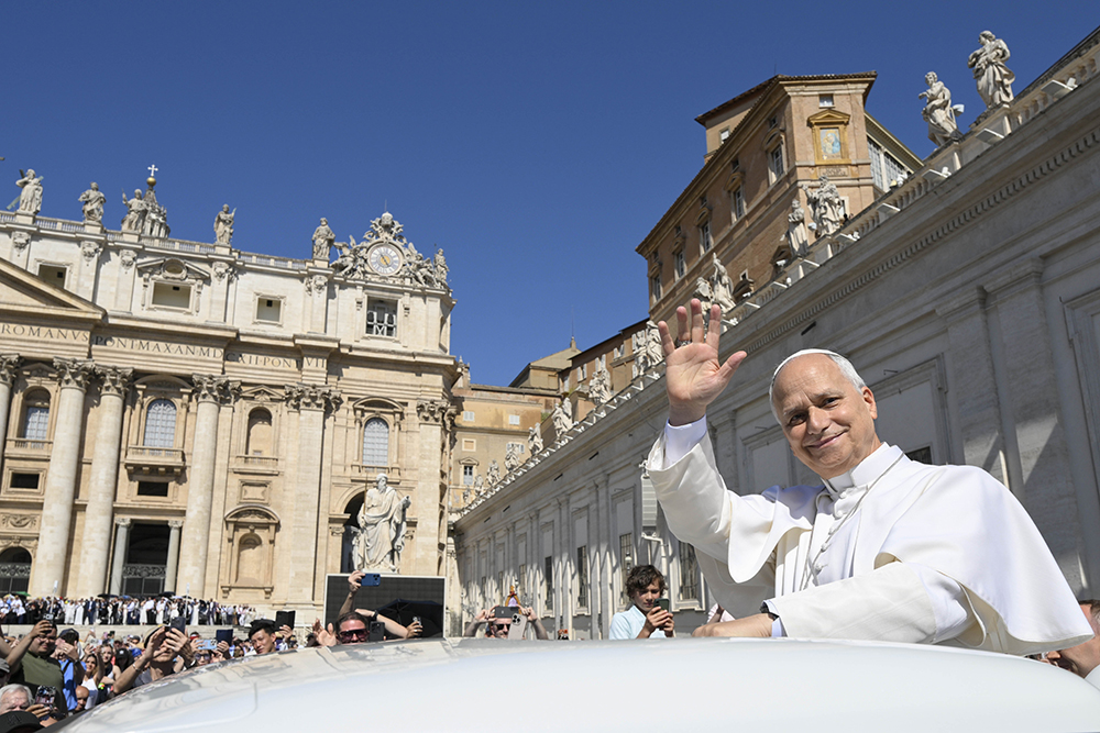 Pope Leo XIV greets visitors and pilgrims from the popemobile while riding around St. Peter’s Square at the Vatican before his weekly general audience May 27, 2026. (CNS/Vatican Media)
