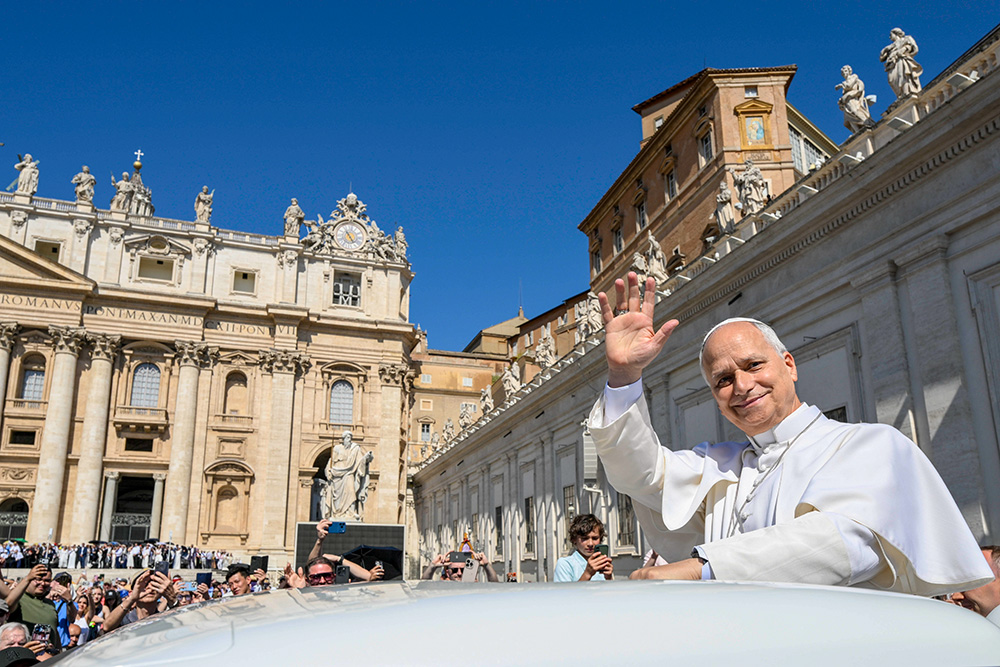 Pope Leo XIV greets visitors and pilgrims from the popemobile while riding around St. Peter’s Square at the Vatican before his weekly general audience May 27, 2026. (CNS/Vatican Media)